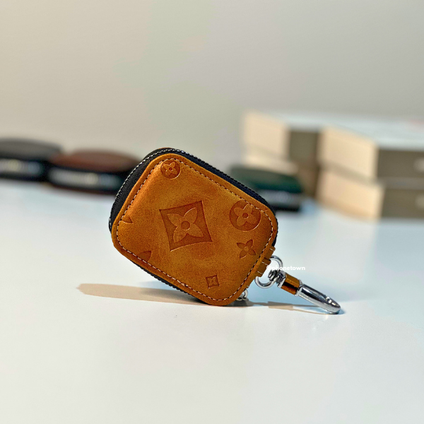 Cache AirPods Luxe en Texture Cuir avec Fermeture Zip – Protection Premium & Porte-clé